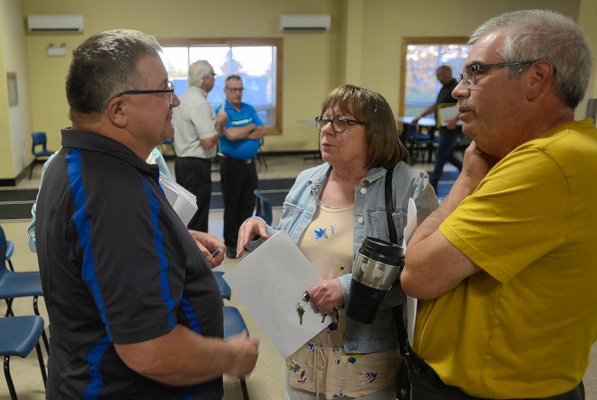 Three Rivers Coun. Wayne Spin, from left, chats with residents Lynne and Richard Guignard following Monday’s council meeting. Lynne, a volunteer with the Georgetown Summer Days committee, expressed disappointment in the town for denying the festival committee’s request for a trailer so it could enter a float in Cardigan’s Canada Day parade and Montague’s Summer Days parade. The town is instead entering one Three Rivers float in all three parades this summer.