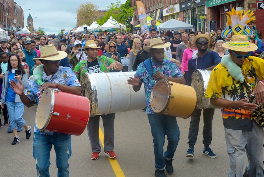 Members of a Bahamian Junkanoo drum group lead a large crowd down Charlottetown’s Queen Street to the opening of Sunday’s DiverseCity Multicultural Street Festival on Sunday. The festival, which is in its 12th year, drew in thousands throughout the afternoon and evening.