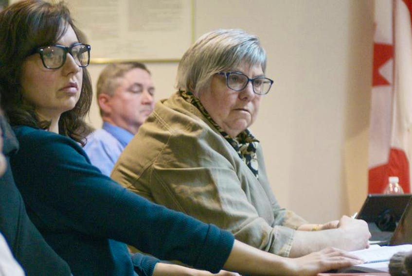 Coun. Debbie Johnston, right, is shown at a Montague town council meeting in 2018.