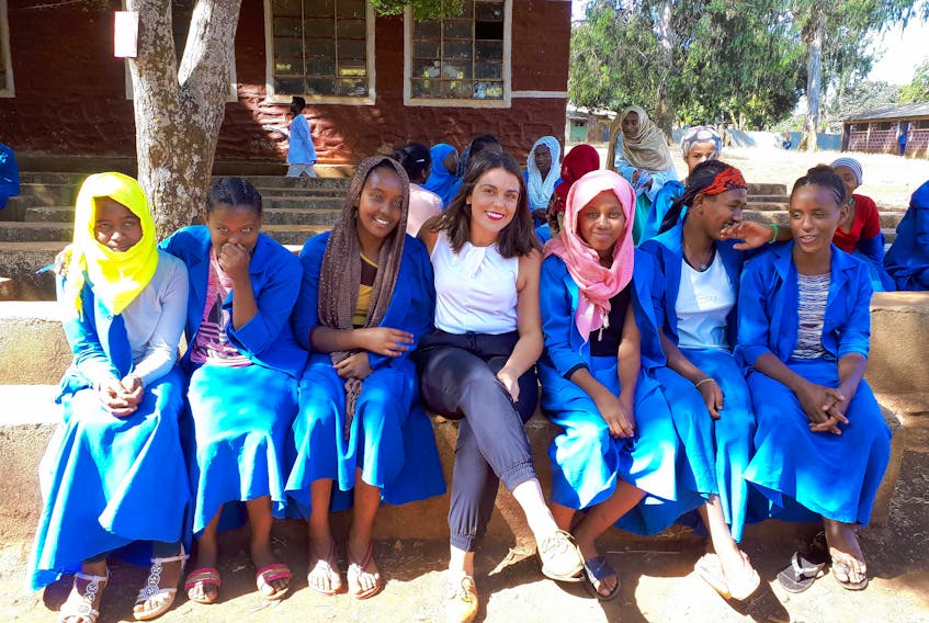Rebecca Gass sits among the girls at a school in Asosa, Ethiopia, who received the human papillomavirus (HPV) vaccination on Dec. 3.