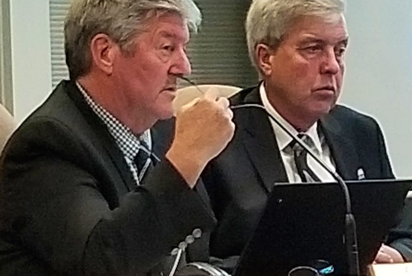 Coun. Gary Clow, left, speaks during the Stratford council meeting Wednesday, Oct. 11, 2018, as Coun. Steve Ogden looks on.