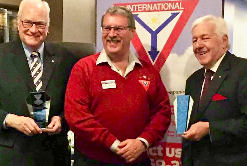 Blair Cutcliffe, middle, president of the Charlottetown Y’s Men’s Club, recently presented the Y’s Man of the Year Award (also known as the Jenkins Memorial Award) to Bill Irwin, left, and the President’s Award, for his work as club treasurer, to Bob Steen.