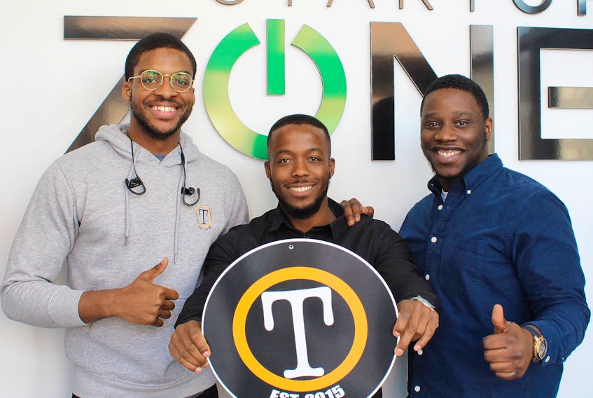 Daniel Ohaegbu, Jonah Chininga and Joshua Daniels are currently working from the Startup Zone on Queen Street in downtown Charlottetown. Missing is Oniel Kuku, who heads operations and graphic design for the company.