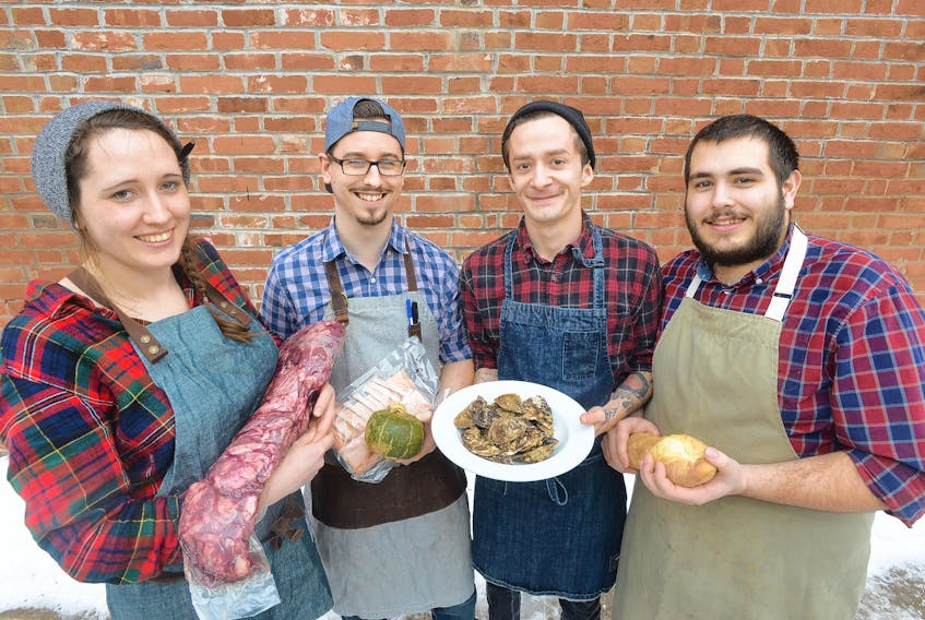 Lucy Morrow, left, Logan Rafuse, Cobey Adams and Hunter Guindon, chefs with the pop-up supper club known as Local., hold some local produce that could be served at one of the monthly pop-up suppers. The items include sourdough bread, tuxedo oysters from Atlantic Shellfish, a rack of lamb from Harmony Meadow Farm, tenderloin from Mike’s Queen Street Meat Market and squash. Morrow is the head chef at Terre Rouge, where Guindon is also a chef, while Adams is a freelance chef and Rafuse is the captain for Team Canada at the Culinary Institute.