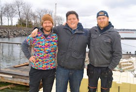 The co-owners of Nimrods’, from left, Jesse Clausheide, Mikey Wasnidge and Nigel Haan, are planning to open a floating pizza bar at the Peake’s Quay Marina in Charlottetown within the next two to three weeks. This operation will include a 5,000-pound wood fired oven.