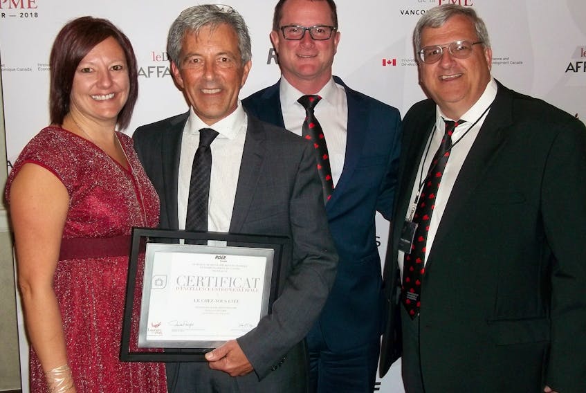 Le Chez-Nous Co-op president Marcel Richard, second left, shares the glory for his national 2018 “Lauriers de la PME” Award with RDÉE PEI representatives, from left, executive director Bonnie Gallant, president Martin Marcoux and communications officer Raymond J. Arsenault during a national gala in Vancouver recently. Le Chez-nous is the third Island business to win one of the awards, with previous winners including HMS Office Supplies in Summerside and The Bottle Houses in Cape Egmont.