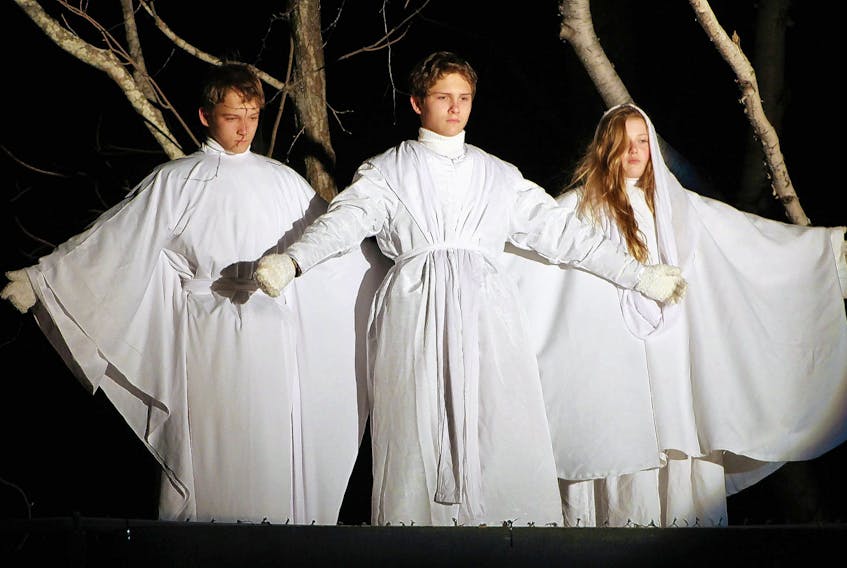 The angels arrive to tell the shepherds about the birth of Jesus during the live nativity pageant held earlier this month at the Church of Jesus Christ of Latter-Day Saints in Charlottetown. Portraying the angels were, from left, Jams MacKay, Christopher MacKay and Harmony Arsenault. This is the 23rd year for the free performance, which has become a Christmas tradition for some P.E.I. families.
