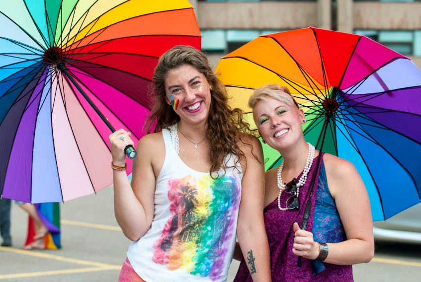 Justeann Hansen, left, and Lora Serres were two of the participants in the annual Pride parade through the streets of Charlottetown last year. Pride P.E.I. is getting set for another week of celebrations, which kick off on Saturday.