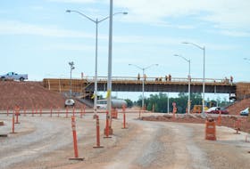 A highway overpass over the Cornwall Road takes shape as work continues on the Trans-Canada Highway’s Cornwall bypass highway on Monday.