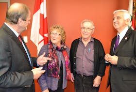Egmont MP Bobby Morrissey, left, discusses western P.E.I.’s tourism statistics with Jeannita Bernard, chairwoman of a North Cape Coastal Tourism Area Partnership steering committee, Stanley MacDonald, NCCTAP president, and Pat Murphy, Minister of Rural and Regional Development. The federal and provincial governments announced $157,500 in funding Friday for two western P.E.I. tourism initiatives.
