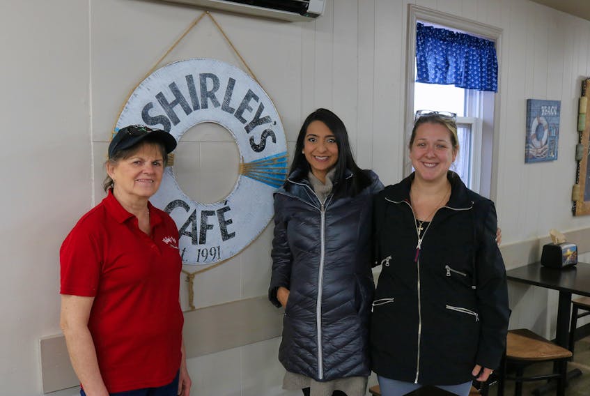 Shirley Harper, owner of Shirley’s Place in Tignish, poses with PC candidate Melissa Handrahan and PC volunteer April Delaney after a lunch rush. Handrahan is running against Liberal incumbent Hal Perry. Stu Neatby/The Guardian