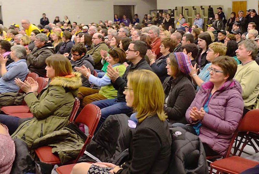 Parents applaud one of the presenters during a public schools review feedback session at Montague Regional High School on Feb. 8, 2017. More than 300 individuals attended the meeting. 

(Mitch MacDonald/Guardian File Photo)