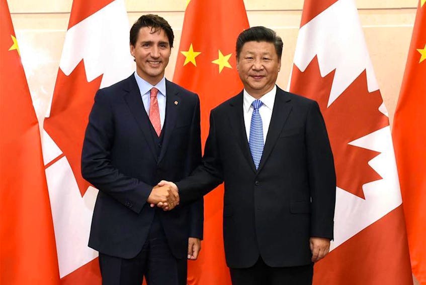 Chinese President Xi Jinping, right, meets with Canadian Prime Minister Justin Trudeau in Beijing, China, in this Aug. 31, 2016 file photo.
 (Xinhua News Agency)