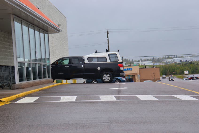 A black truck parks in the new right turning lane that used to be a parking area by the Atlantic Superstore on May 29 in Charlottetown.
