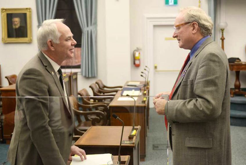 Green Leader Peter Bevan-Baker, left, chats with Premier Wade MacLauchlan during a break in P.E.I. legislature proceedings in this December 4, 2017 Guardian file photo.

(The Guardian / Mitch MacDonald)