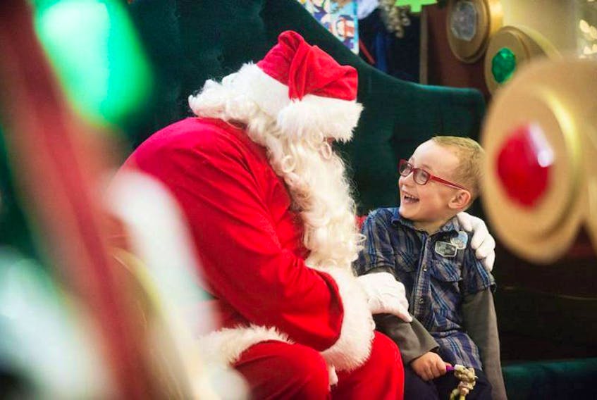 Connor Cudmore responds as only a child can upon meeting Santa Claus during the Victorian Christmas weekend in Charlottetown. 
(Guardian File Photo)