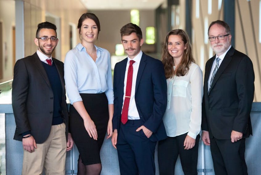 UPEI’s NIBS case team, including, from left, Hani Mayaleh, Taylor Meek, Alec Brown, Olivia Lantz and Bill Waterman (coach), are hosting the Network of International Business Schools (Worldwide Case Competition championship).