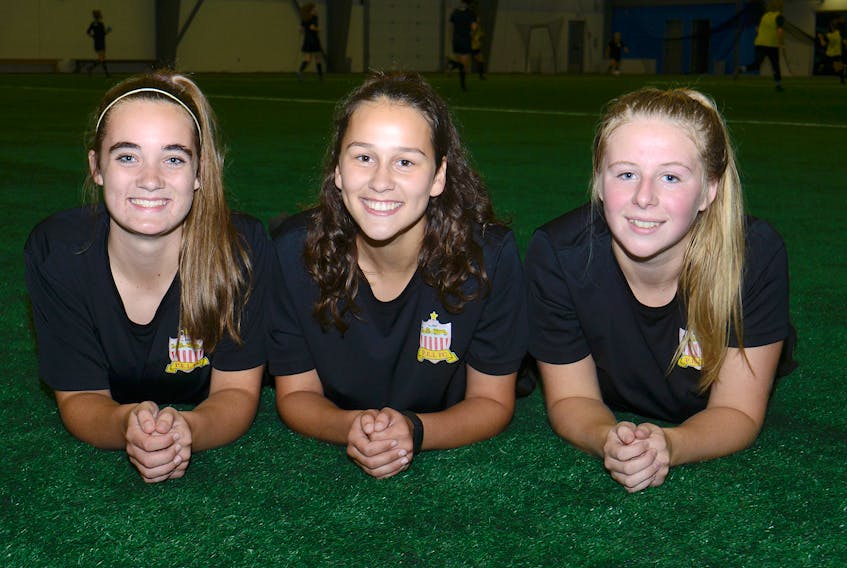 P.E.I. F.C. is the host team for the Canada Soccer Toyota National Championships Under-17 Cup this week in Cornwall and Charlottetown. Three of their veterans are, from left, Helena Vos, Mackayla Vos and Louisa McMurrer.