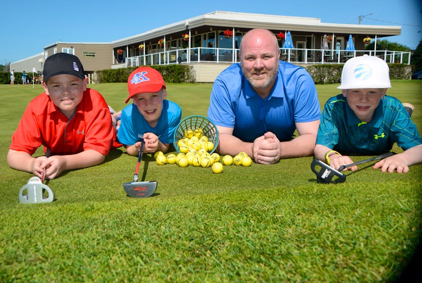 The Kenmac Energy Family Golf Classic will take place Thursday, July 18, at the Belvedere Golf Club in Charlottetown. From left are Beckett Quinn, Carter Campbell, Duane Richards of Kenmac Energy and Liam Moore.