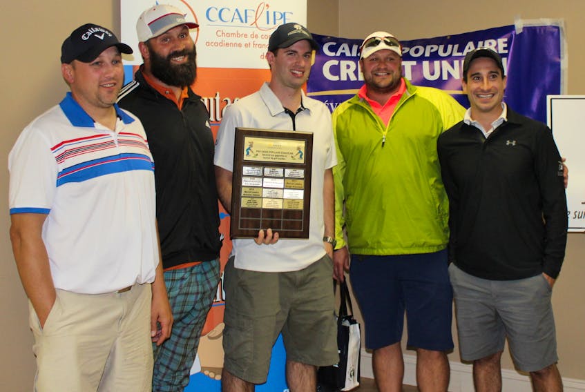 Les Hackeux received its plaque from Marc Côté, centre, representing the event’s main sponsor, Evangeline-Central Credit Union, after winning the 13th annual Acadian Golf Tournament. From left are Ghislain Bernard, Nick Gallant, Côté, Jamie Caissie and Marcel Landry.