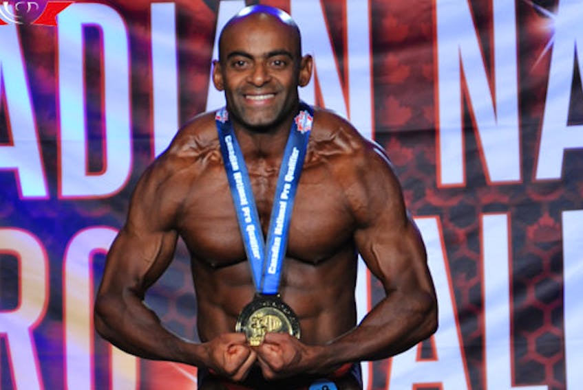 Charlottetown’s Christo Jose poses with his gold medal won in the lightweight class at the recent senior national bodybuilding championships in Toronto.
