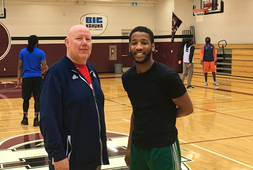 Island Storm head coach Tim Kendrick, left, and shooting guard Tyler Scott have dealt with injury issues to their National Basketball League of Canada squad since early January. At one point the team was 8-4, but is now 10-15 and fighting with the Cape Breton Highlanders for the last playoff spot in the Atlantic Division.