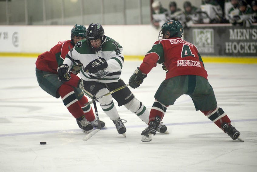 Charlottetown Bulk Carriers Pride forward Alex Graham tries to split a pair of Kensington Monaghan Farms Wild defenders during major midget hockey action earlier this month at MacLauchlan Arena. Graham will play for Team P.E.I. at the 2019 Canada Games in Red Deer, Alta.