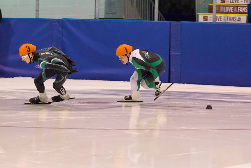 Thomas McQuaid, left, and Matt Kozma earned gold and silver medals, respectively, for P.E.I. at the recent Harold Joyce short track speedskating championships in Fredericton, N.B.  (Amanda Burke)