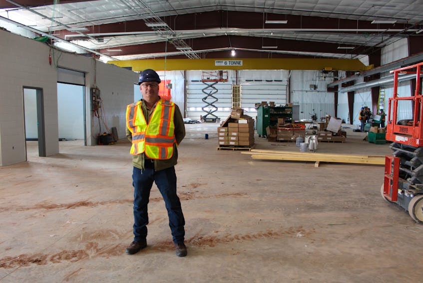 Jeff Wood, store manager for Green Diamond Equipment Ltd., stands inside the company’s new retail and repair facility at 15 Locke Shore Rd. in Sherbrooke. The new building replaces the previous one, which burned down in 2016.