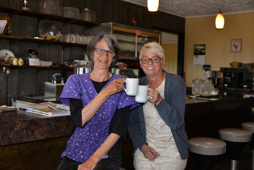 Alie Mills, right, is the new owner of the Red Rooster Family Restaurant in Crapaud. She has worked in the restaurant for the past three years. Marion Miller, left, who has owned the restaurant for nearly 45 years, is staying on to help with the transition.