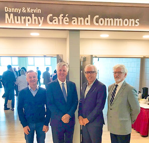 Holland College foundation board chairman Ron Keefe, left, and Holland College president Sandy MacDonald, right, congratulate leadership donors Danny and Kevin Murphy, centre, on the naming of the Danny and Kevin Murphy Café and Commons at the college’s Tourism and Culinary Centre in Charlottetown.