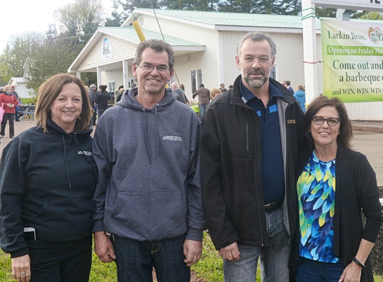 Larkin family members, from left, Rosemary, Harvey, Paul and Linda celebrate the grand opening of a retail storefront at their Crapaud processing plant last week. The company, which grows turkeys at a family farm in New Glasgow, took on ownership of the plant in March.