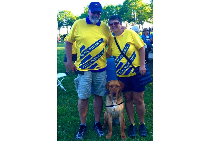 Patricia Doiron, her partner, Russ McCabe, a cancer survivor as well, and his service dog, Sophie, are shown at the Queens County Relay for Life in 2016. This year’s event takes place June 8 at Confederation Landing Park, from 6 p.m. to midnight.
