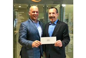 Kerry Butler, left, VP of operations with MDS Coating Technologies, presents a $5,000 donation to Brian Thompson, QEH Foundation board member, in support of the 2018-19 Friends for Life Campaign. This gift will help support the purchase of an iterative cone-beam CT for the P.E.I. Cancer Treatment Centre at the Queen Elizabeth Hospital. The iterative cone-beam CT is a technology that will allow health care workers an improved view of a patient’s soft tissue structure, which will help physicians better tailor unique treatment plans. Submitted
