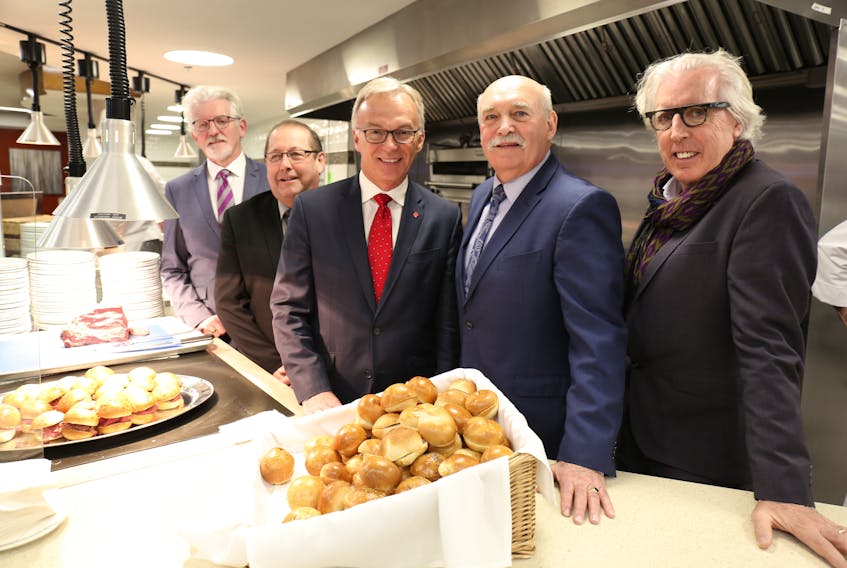 Holland College president Sandy MacDonald, left, is joined by Sonny Gallant, minister of workforce and advanced learning; MP Sean Casey, Brian McMillan, former Holland College president, and Kevin Murphy, chairman of the Nourish Campaign.