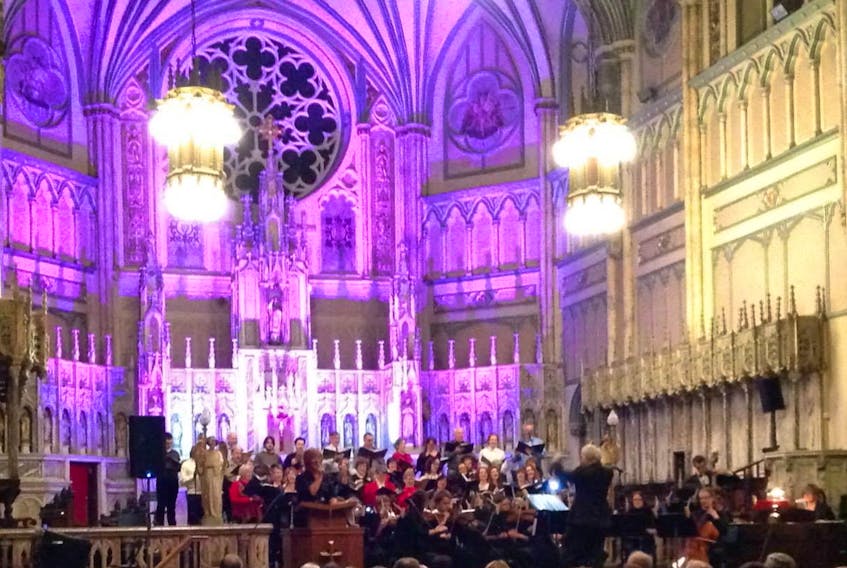 Leo Marchildon directs choristers and musicians during last year’s Christmas concert at St. Dunstan’s Basilica in Charlottetown. This year’s will be held today at 7 p.m.