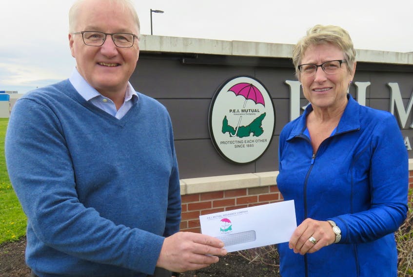 Blair Campbell, CEO of the P.E.I. Mutual Insurance Company of Summerside presents a cheque to provincial youth talent co-ordinator Jean Tingley. As platinum sponsor of the P.E.I. Association of Exhibitions for the past 20 years, P.E.I. Mutual Insurance has donated $322,000 to support the Youth Talent Program and other projects at PEIAE fairs, festivals and exhibitions held each summer on the Island.