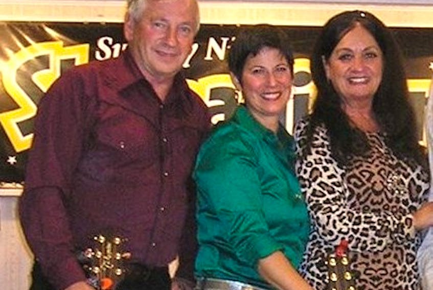 Host Judy MacLean, centre, is joined by Lester MacPherson and Kelley Mooney at a recent musical event. The two performers are part of the lineup for the 2018 Spring Stars Concert for the QEH.