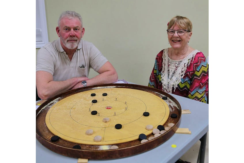Gerard Koughan of Johnston’s River and Gloria Matheson of Charlottetown are shown at the Crokinole Spring Fling held recently at the Cotton Centre in Stratford. Leo Kelly/Submitted photo