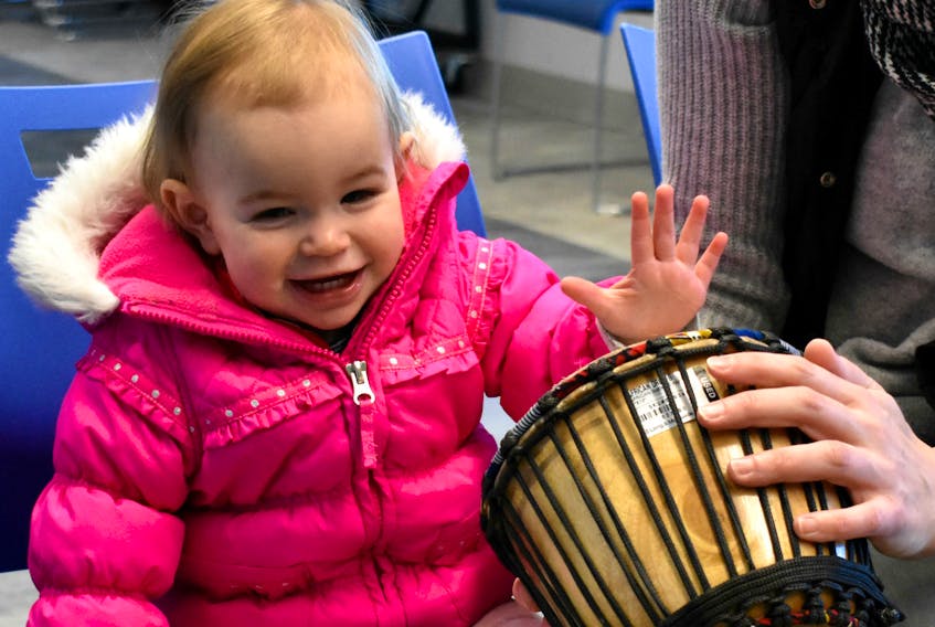 Stephanie Sheppard brought her 15-month-old daughter, Lucy, to celebrate the important role drums played in the preservation of African rhythmic heritage at Summerside Rotary Library last weekend.