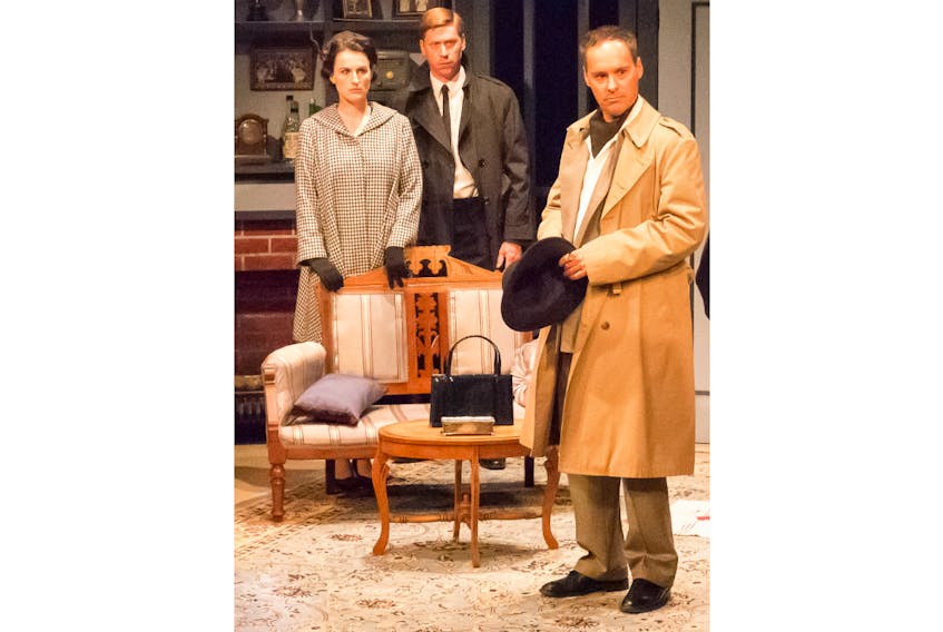 Actors are shown in a scene from “Dial M for Murder” at the Watermark Theatre.