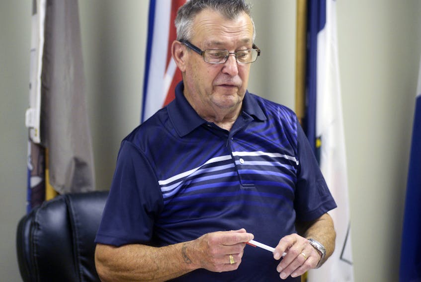 Georgetown Mayor Lewis Lavandier speaks near the end of Monday's council meeting. The meeting saw Lavandier break a tie vote to accept a memorandum of settlement and re-include the town in a Three Rivers amalgamation proposal.