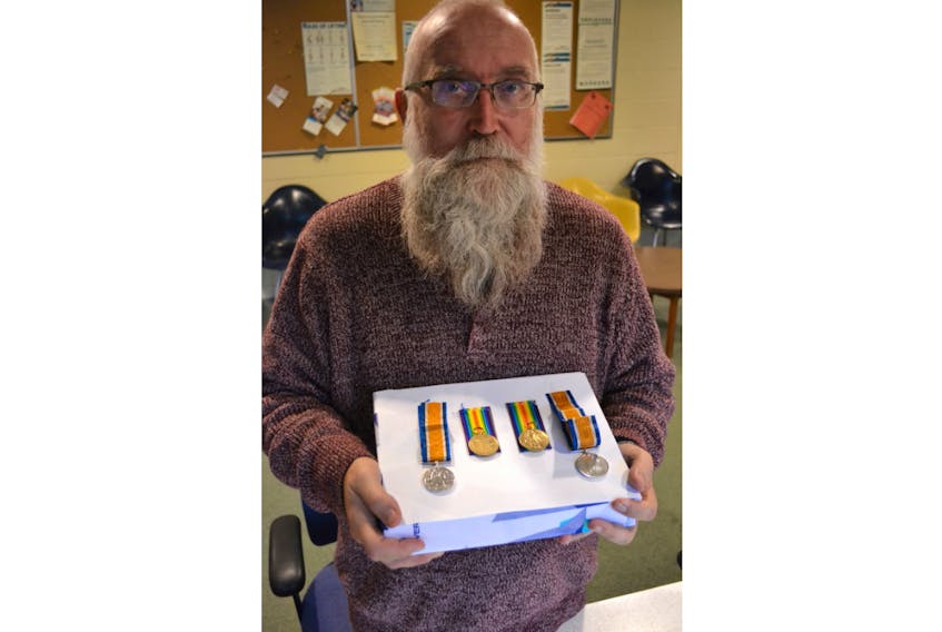 P.E.I. resident Leo Cheverie shows the medals that were awarded to his great-uncles, Thomas Vincent Holland and Joseph Holland, for their service during the First World War. They were both killed in 1918, in the last 100 days of the war.