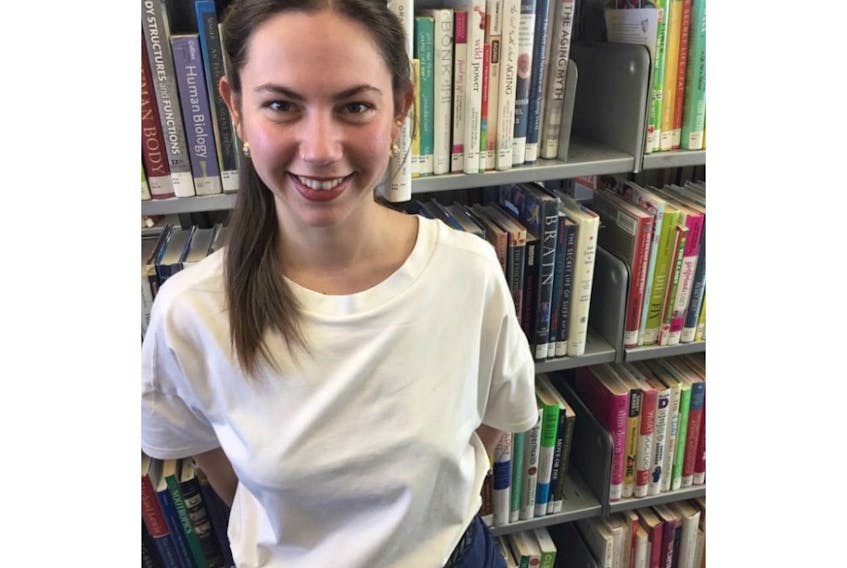 P.E.I. midwifery student Amy-Mae Jewell is shown in the Ryerson Library in Toronto.