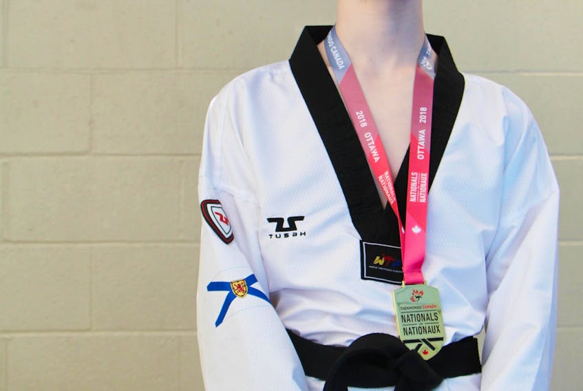 Jack Lowther, of Xavier Taekwondo, is pictured at the home of the Antigonish-based club with the gold medal he earned at the 2018 National Taekwondo Championships which were held in Ottawa, Feb. 15 to 18.