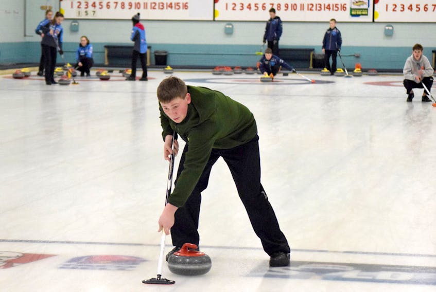 David McCurdy of the Adam McEachren rink sweeps during a practice session this week at Truro Curling Club.