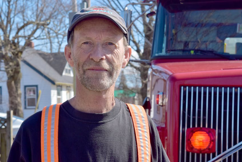 Salmon River volunteer firefighter Dwayne Green helped guide an elderly resident out of a burning house during a fire last week.
