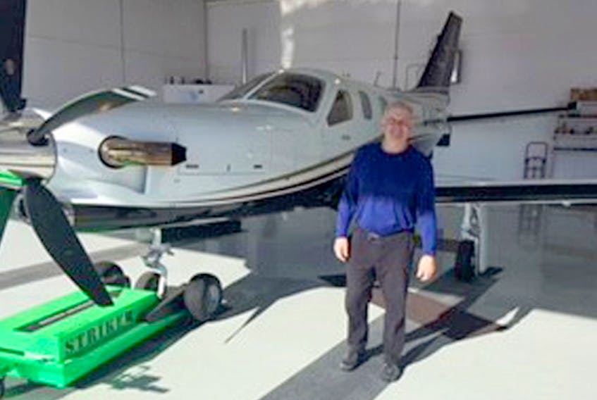 Besides having a passion for hockey, Glen Dickey, shown with his Daher Sonata TBM 900 turbo prop, has been a longtime pilot.