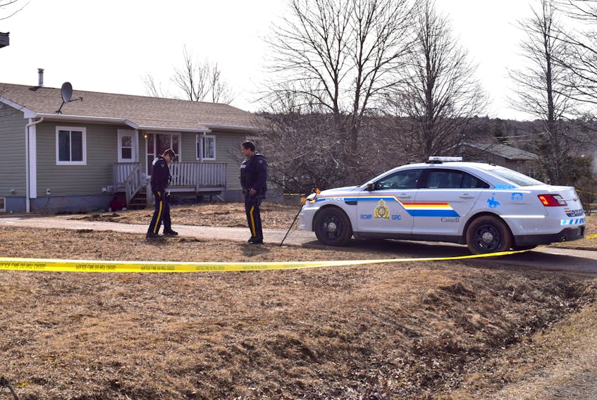 RCMP members were still on the scene Monday morning at 905 Willow St., where a suspicious death occurred overnight Saturday involving a 46-year-old man. A 25-year-old man and a 35-year-old woman have been arrested in relation to the case.