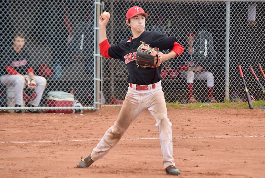 Truro Bearcats pitcher Darsey Pratt fires to first after fielding a ground ball during action at a midget A baseball tournament last weekend in Truro.
